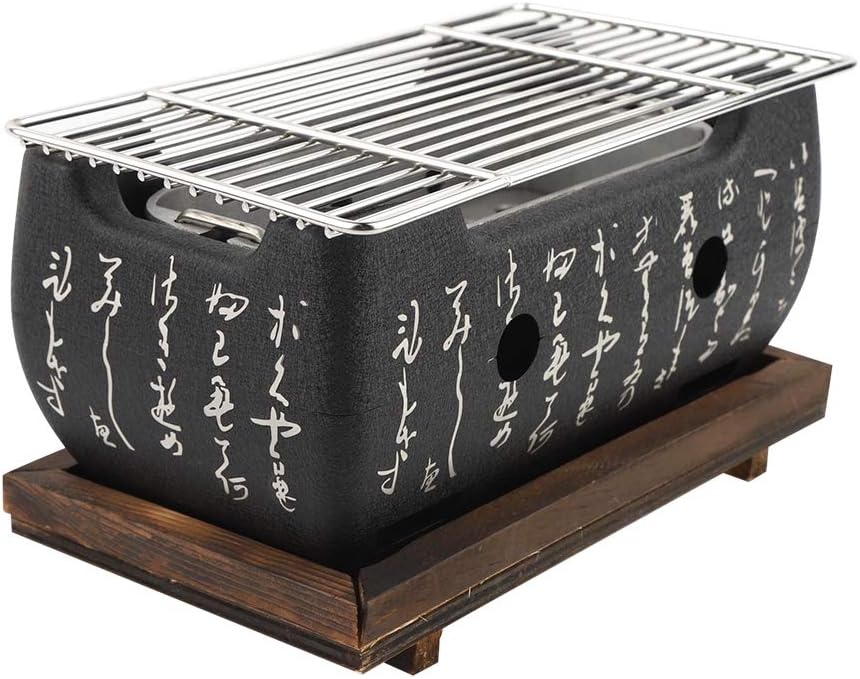 Black barbecue grill with white text on a wooden base
